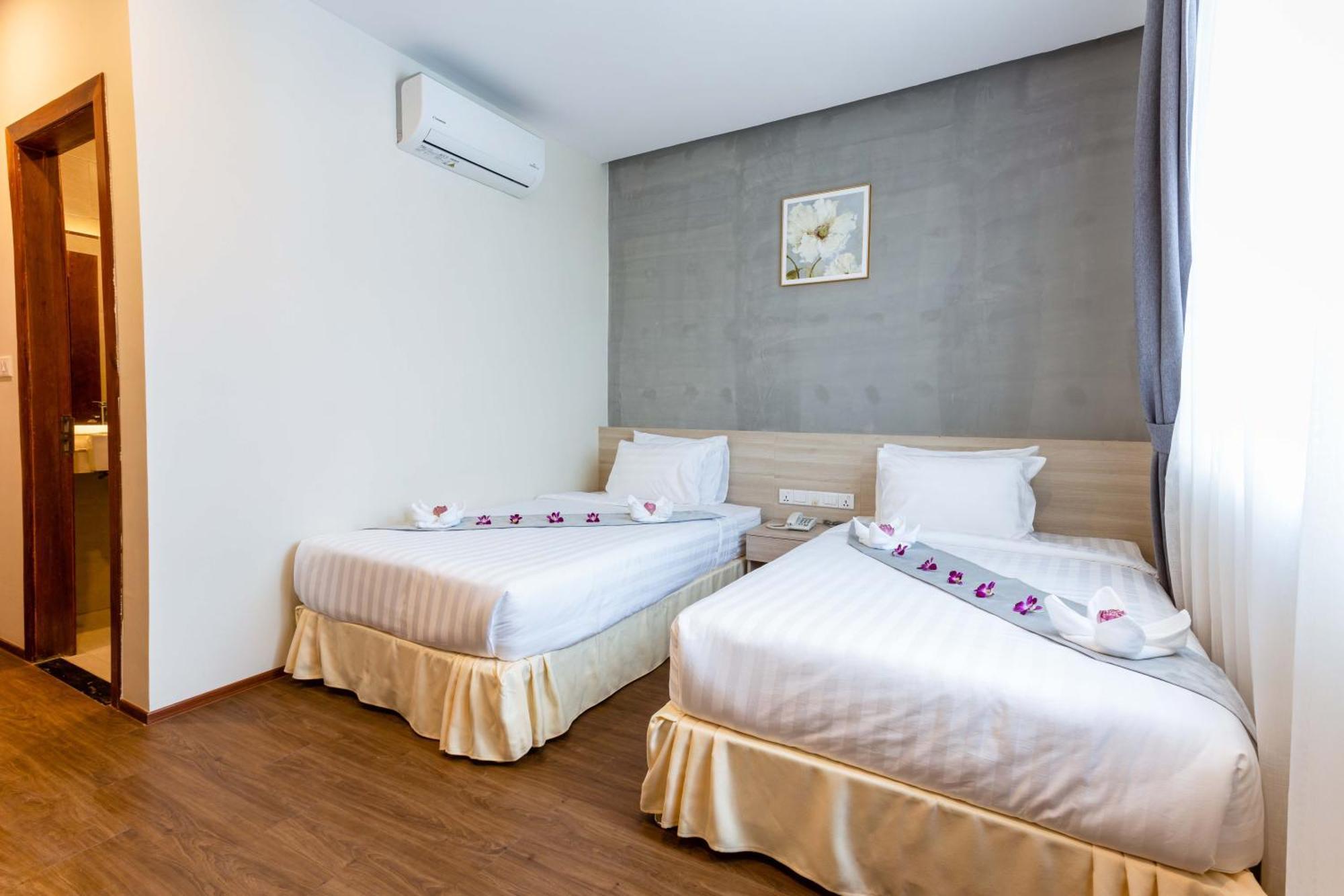 Joli Hotel Phnom Penh Habitación foto
