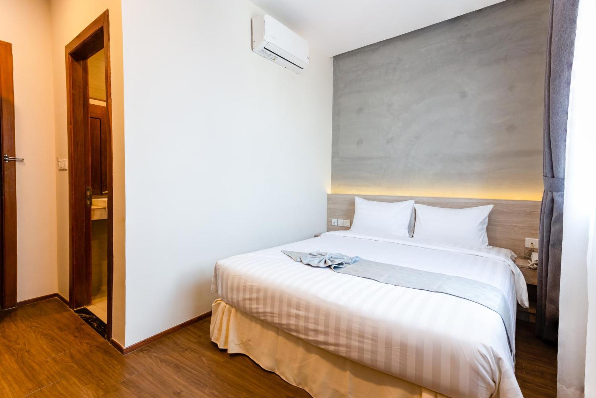 Joli Hotel Phnom Penh Habitación foto